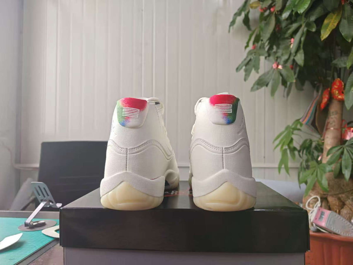 Air Jordan 11 Retro 'Sail Off-White Newsprint Sport Royal'