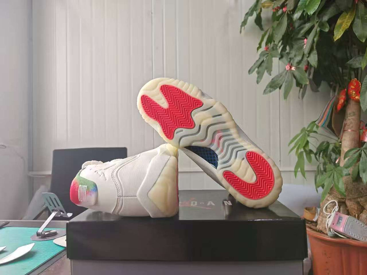 Air Jordan 11 Retro 'Sail Off-White Newsprint Sport Royal'